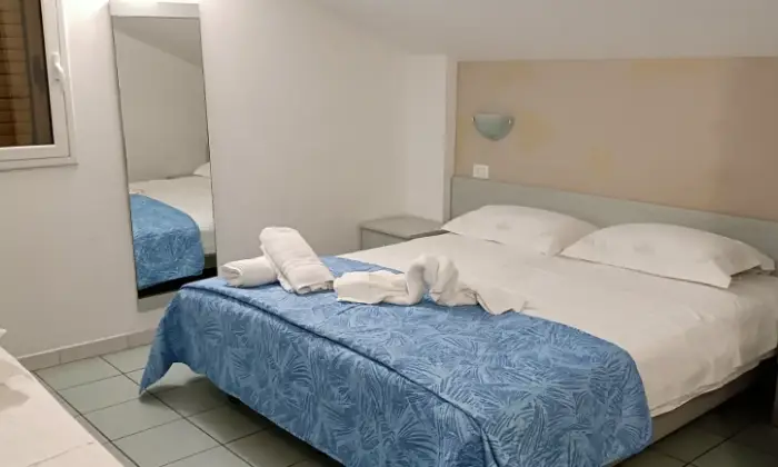 Rexer-Vittoria-In-vacanza-in-villaggio-turistico-CasaVacanze-Le-Mansarde-in-Athena-Resort-Scoglitti-RG-CAMERA-DA-LETTO