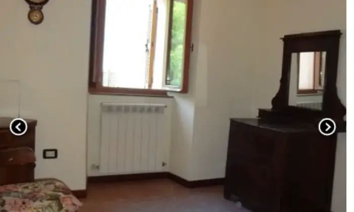 Rexer-Sefro-Appartamento-in-Roma-Sefro-CAMERA-DA-LETTO