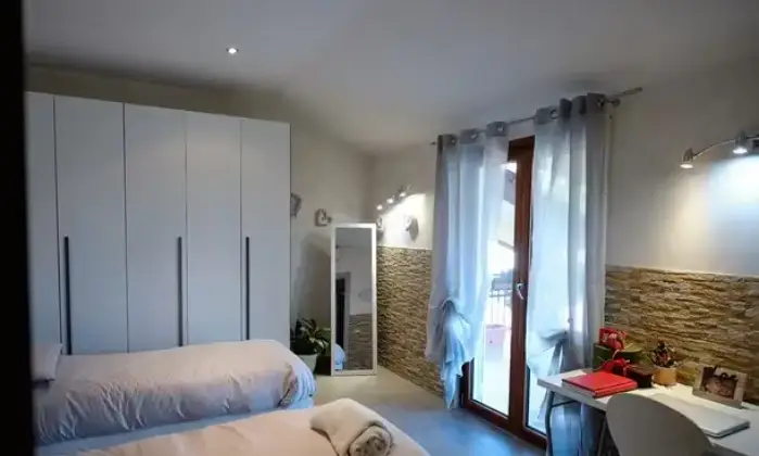Rexer-Anzio-Attico-in-vendita-in-via-del-Cinema-ad-Anzio-CameraDaLetto
