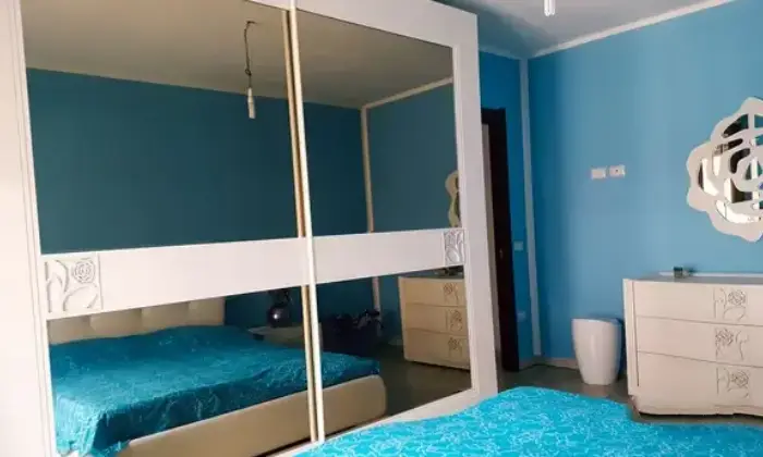 Rexer-Sassari-Appartamento-in-Viale-Sicilia-Sassari-CameraDaLetto