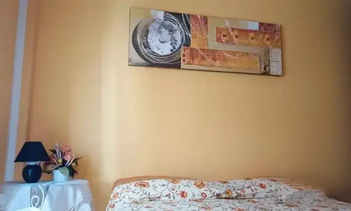 Rexer-Sassari-Appartamento-in-Viale-Sicilia-Sassari-CameraDaLetto