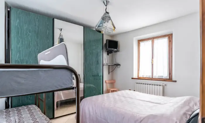 Rexer-Sestola-Deliziosa-casa-immersa-nel-verde-con-mansarda-taverna-e-ampio-spazio-esterno-CAMERA-DA-LETTO