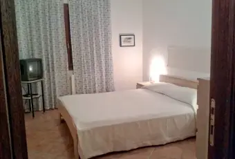 Rexer-La-Maddalena-APPARTAMENTO-TRILOCALE-CON-PARCHEGGIO-PRIVATO-CameraDaLetto