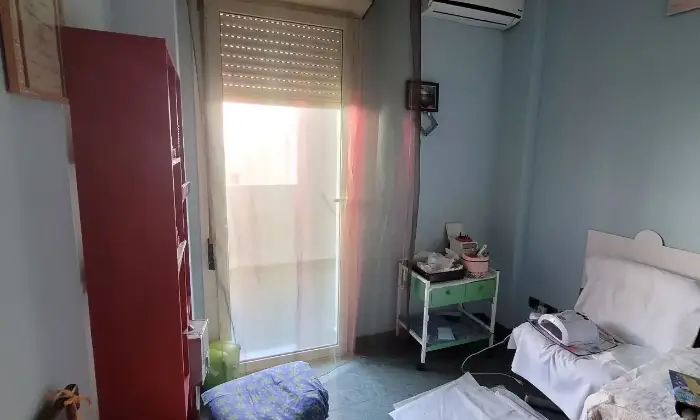 Rexer-Cagliari-Vendesi-Splendido-Appartamento-via-Balilla-CameraDaLetto