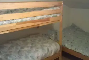 Rexer-Ardesio-Vendesi-appartamento-in-via-Val-las-Ardesio-CameraDaLetto