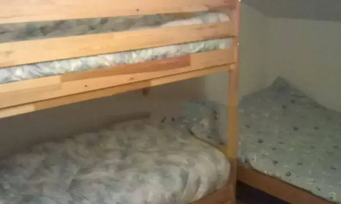 Rexer-Ardesio-Vendesi-appartamento-in-via-Val-las-Ardesio-CameraDaLetto