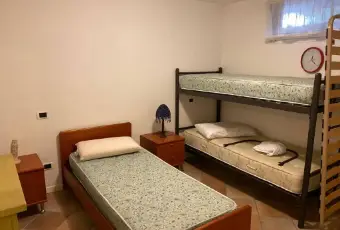 Rexer-Cervia-Villa-a-schiera-viale-Damiano-Chiesa-Milano-Marittima-Cervia-CameraDaLetto