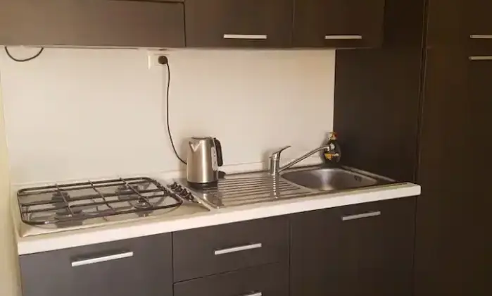 Rexer-Parghelia-stanze-da-letto-e-piscina-a-due-passi-daTropea-Cucina