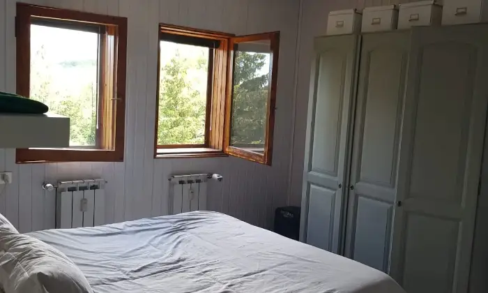 Rexer-Ventasso-Appartamento-Cerreto-Laghi-CameraDaLetto