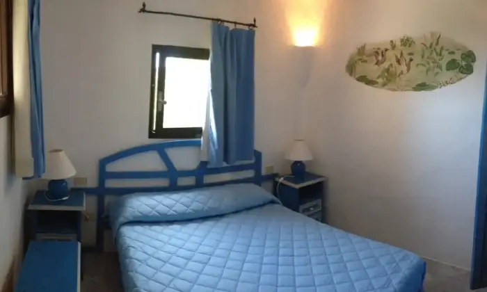 Rexer-Arzachena-Baja-Sardinia-incantevole-trilocale-fronte-mare-ultime-disponibilit-luglio-CameraDaLetto