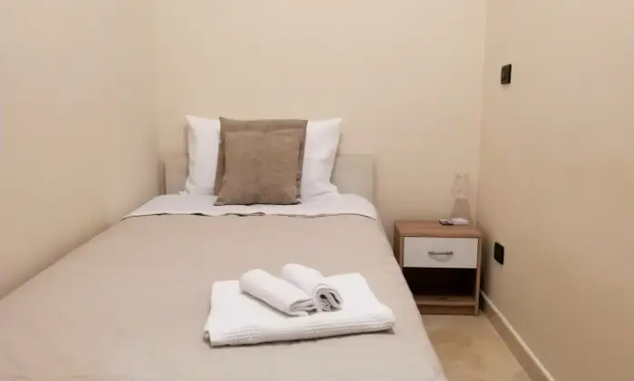 Rexer-Reggio-di-Calabria-Loft-Magna-Grecia-Centro-Storico-Reggio-Calabria-CameraDaLetto