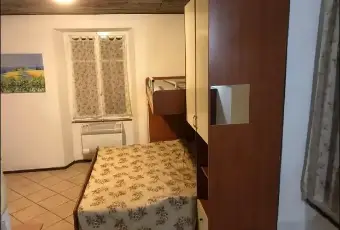 Rexer-Baveno-Appartamento-in-Via-San-Carlo-Baveno-CameraDaLetto