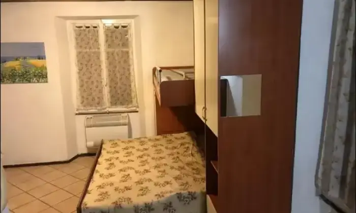 Rexer-Baveno-Appartamento-in-Via-San-Carlo-Baveno-CameraDaLetto