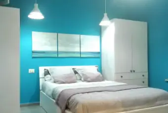 Rexer-Napoli-Centralissimo-e-accogliente-bilocale-CameraDaLetto