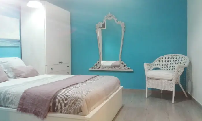 Rexer-Napoli-Centralissimo-e-accogliente-bilocale-CameraDaLetto
