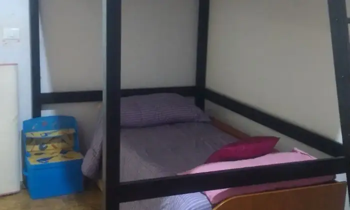 Rexer-Cepagatti-Appartamento-con-due-camere-e-camino-CameraDaLetto