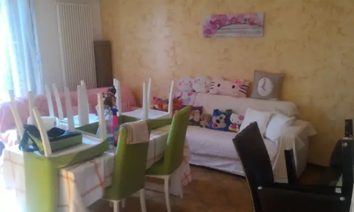 Rexer-Cepagatti-Appartamento-con-due-camere-e-camino-CameraDaLetto