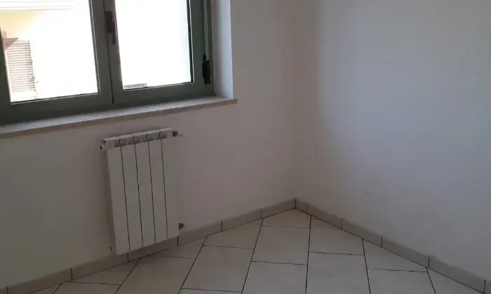 Rexer-San-Giuliano-di-Puglia-Appartamento-con-terrazzo-e-garage-CameraDaLetto