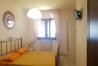 Rexer-Perito-Appartamento-in-vendita-in-via-dei-Greci-CameraDaLetto
