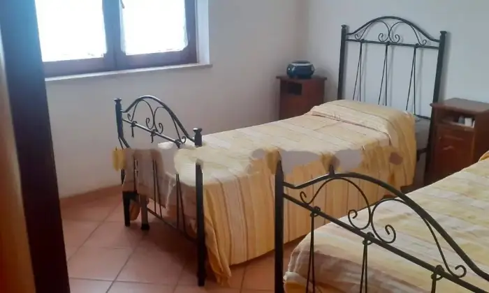 Rexer-San-Vito-Lo-Capo-Trilocale-via-del-Frumento-Castelluzzo-San-Vito-Lo-Capo-CameraDaLetto