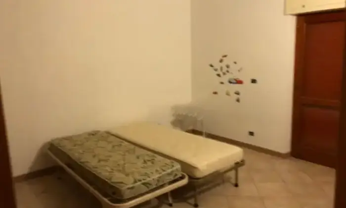 Rexer-Torre-Orsaia-Quadrilocale-in-vendita-in-largo-San-Leonzio-CameraDaLetto