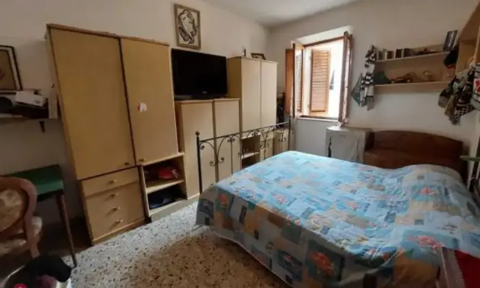 Rexer-Asciano-Appartameto-centro-storico-CameraDaLetto
