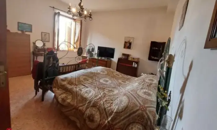 Rexer-Asciano-Appartameto-centro-storico-CameraDaLetto