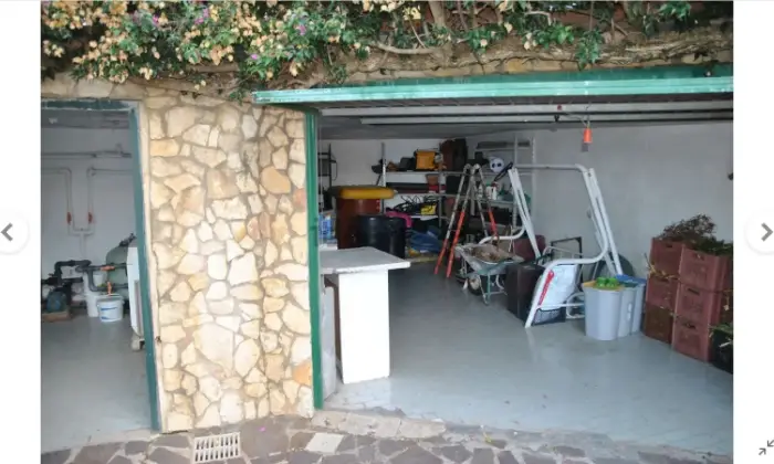 Rexer-Itri-Villa-panoramica-piscina-privata-giardino-zona-barbecue-forno-pizze-uliveto-Garage