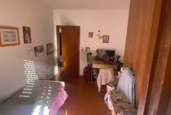 Rexer-Aulla-Quadrilocale-in-vendita-in-piazza-Ferruccio-Parri-CameraDaLetto