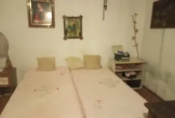 Rexer-Ficarra-Romantica-casetta-in-un-borgo-medievale-siciliano-CameraDaLetto