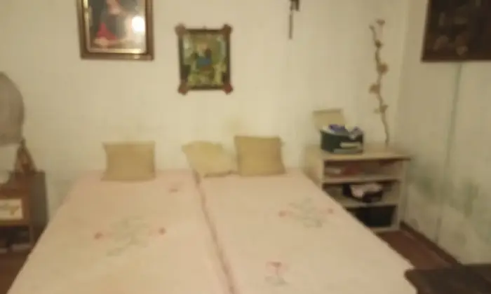 Rexer-Ficarra-Romantica-casetta-in-un-borgo-medievale-siciliano-CameraDaLetto