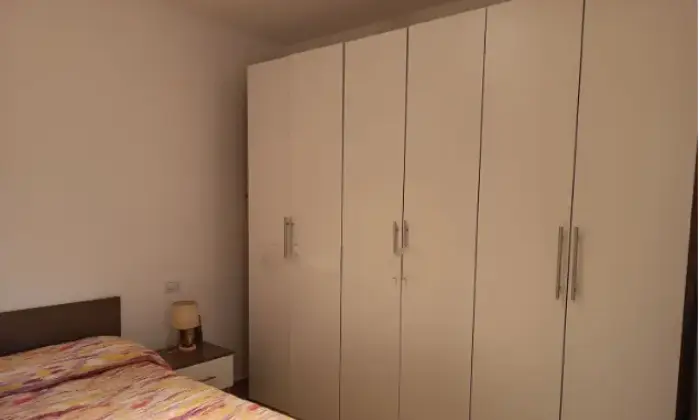 Rexer-Sassari-Bilocale-in-vendita-in-via-Carlo-Ruggiu-CameraDaLetto