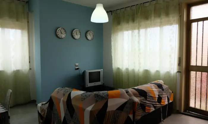Rexer-Catania-Appartamento-solamente-a-metri-dal-mare-CameraDaLetto