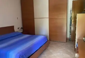 Rexer-Nuoro-Appartamento-in-Via-Palmiro-Togliatti-Nuoro-CameraDaLetto