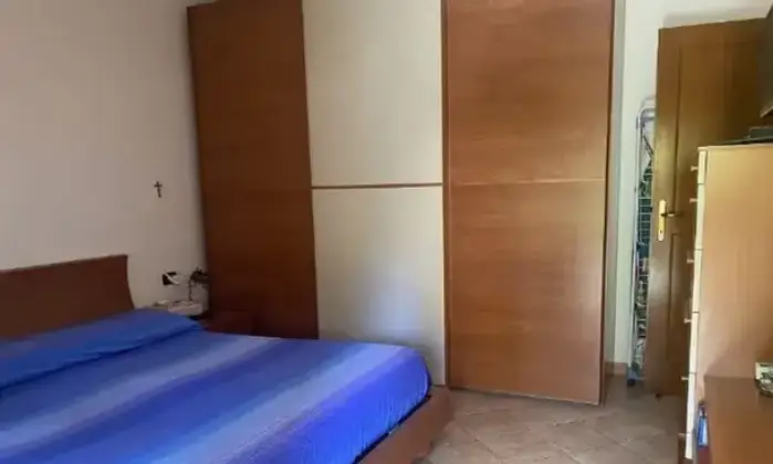 Rexer-Nuoro-Appartamento-in-Via-Palmiro-Togliatti-Nuoro-CameraDaLetto