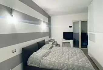 Rexer-Osini-Vendesi-appartamento-in-Viale-Trieste-OSINI-NU-CameraDaLetto