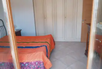 Rexer-Sabaudia-Appartamento-signorile-CameraDaLetto