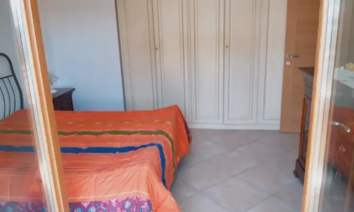Rexer-Sabaudia-Appartamento-signorile-CameraDaLetto