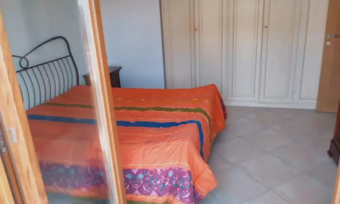 Rexer-Sabaudia-Appartamento-signorile-CameraDaLetto
