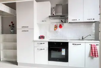 Rexer-Milano-Elegante-openspace-zona-servitissima-Cucina