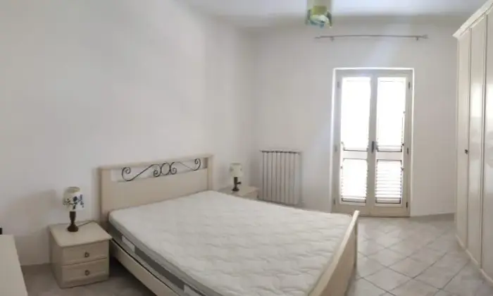 Rexer-Rovito-Vendesi-appartamento-al-primo-piano-a-Rovito-CAMERA-DA-LETTO