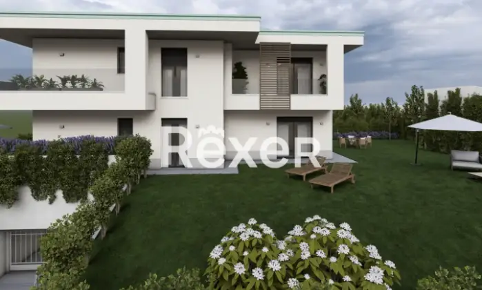 Rexer-CAPIAGO-INTIMIANO-Bilocale-con-terrazzo-e-sottotetto-Nuova-Costruzione-Giardino