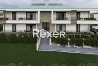 Rexer-CAPIAGO-INTIMIANO-Bilocale-con-terrazzo-e-sottotetto-Nuova-Costruzione-Giardino