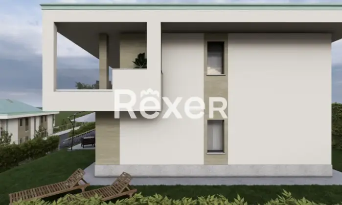 Rexer-CAPIAGO-INTIMIANO-Bilocale-con-terrazzo-e-sottotetto-Nuova-Costruzione-Giardino