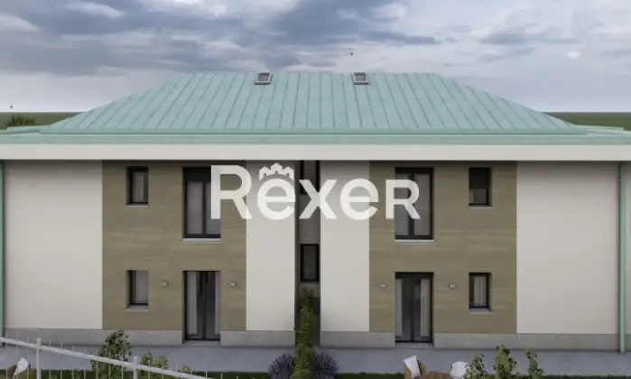 Rexer-CAPIAGO-INTIMIANO-Bilocale-con-terrazzo-e-sottotetto-Nuova-Costruzione-Giardino