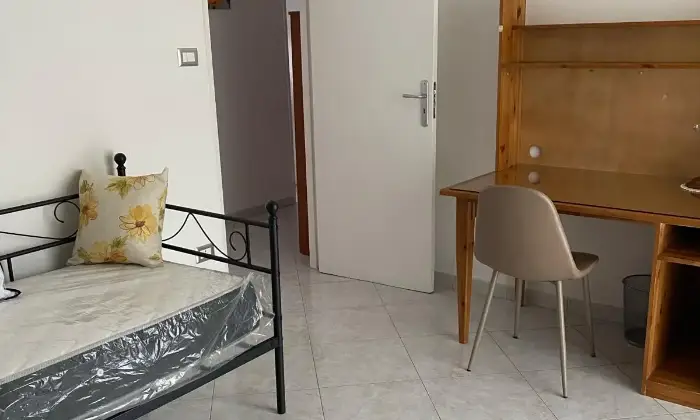 Rexer-Napoli-Affittasi-stanze-a-studentesse-CameraDaLetto
