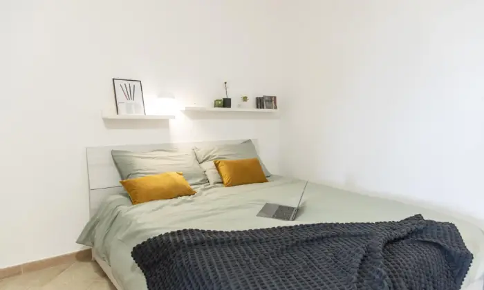 Rexer-Ciampino-BILOCALE-CON-ELEGANTE-ZONA-LIVING-CameraDaLetto