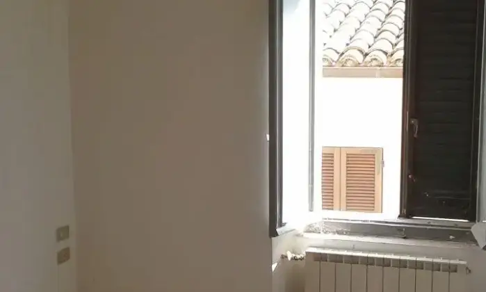 Rexer-Sassoferrato-Vendo-appartamento-via-Bizzarri-CameraDaLetto
