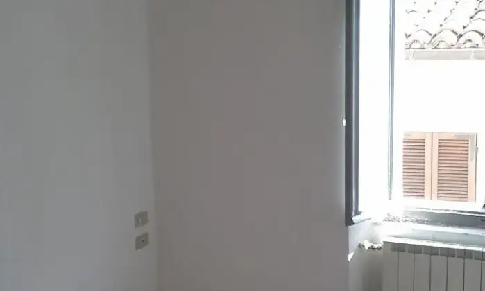 Rexer-Sassoferrato-Vendo-appartamento-via-Bizzarri-CameraDaLetto