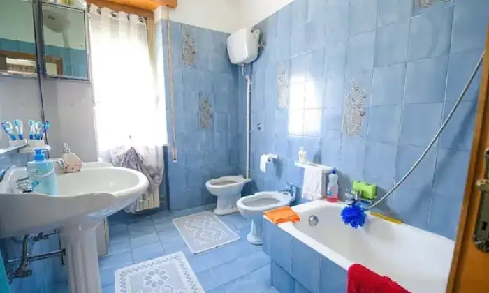 Rexer-Portocannone-Palazzina-a-Portocannone-di-tre-unit-abitative-Bagno